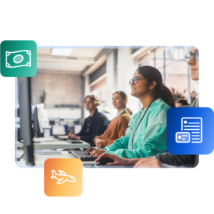 Three students look at computer screens inside a computer lab at a university